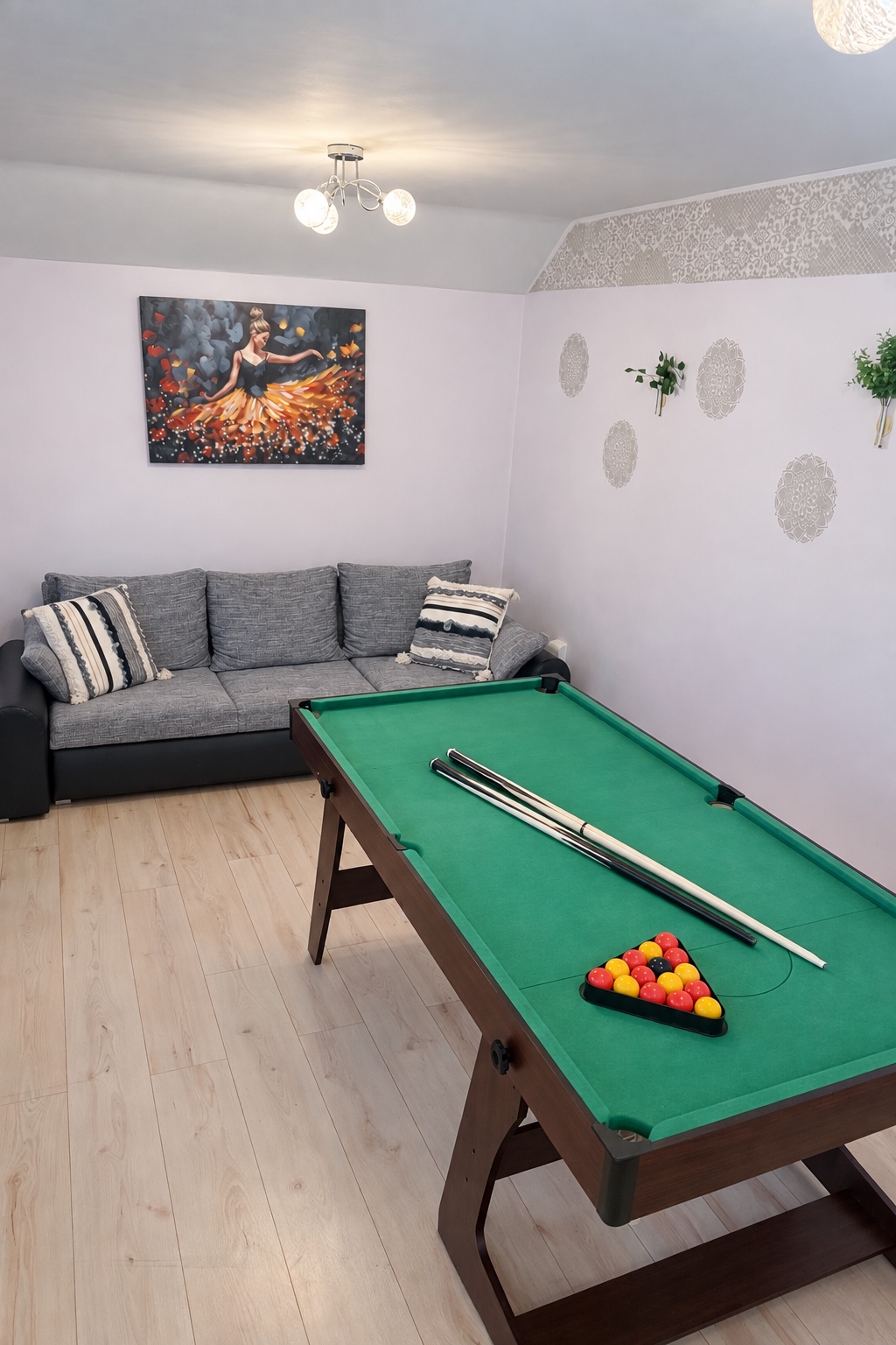 Living room with sofa and pool table